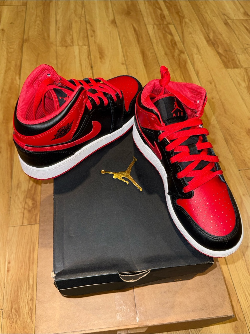 Air Jordan 1 Mid Youth Red and Black Mid-Top Sneakers